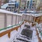 Square crop Snowy outdoor stairs overlooking Park City Utah community in winter