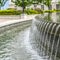 Square crop Stone fountain with trickling water and pool at the Utah State Capital Builidng