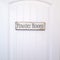 Square crop White panelled door with rustic rectangular wooden Powder Room sign