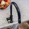 Square Curved gooseneck shaped black faucet over kitchen island sink with double bowls