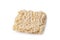 Square dry egg noodles in a briquette isolated on a white background