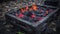 a square fire pit with flames burning in it\\\'s center