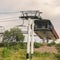 Square Focus on chairlifts over mountain of Park City Utah against cloudy sky in summer