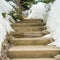 Square frame Close up of concrete outdoor steps on a slope covered with fresh snow in winter