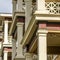 Square frame Close up of square columns and lattice railing framing the balcony of townhomes