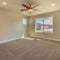 Square frame Empty room of a new house with beige wall paint and carpeted floor