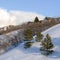 Square frame Homes on pristine acres of Wasatch Mountains blanketed with snow in winter