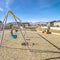 Square A-frame kids swings in an urban playground