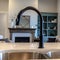 Square frame Kitchen island with double basin undermount sink black faucet and fruit basket