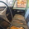 Square frame Old vintage car with close up of the steering wheel and dirty interior