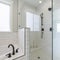 Square frame Shower stall with tiles and cohesive plumbing fixtures