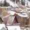 Square frame Stunning winter neighborhood with colorful houses nestled on snow covered hill