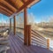 Square frame Wooden porch overlooking winter countryside day light