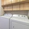 Square Functional laundry room with appliances and double basin sink and cabinets