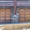 Square Garage entrance under the snowy balcony of a home in Park City Utah in winter