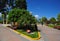 square with a garden of exotic flowers and sculptures of water fountain figures, moyobamba san martin peru -october