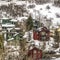 Square Homes built on a mountain blanketed with snow during winter season