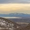 Square Lake and vast valley viewed from a mountain with trees and snow