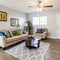 Square Living room with front door and bright window