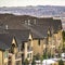 Square Luxurious homes with valley lake mountain and cloudy sky in the background