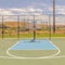 Square Outdoor basketball court on sunny, blue day