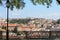 Square with panoramic view on Lisbon, Portugal - architecture, hills, green trees