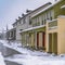 Square Pathway in front of cozy homes in Daybreak Utah viewed in winter