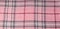 Square pattern fabric background. Textures pink and white cotton fabric. The pattern for textiles. Cell. Shirts plaid. Trendy