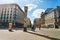 Square with people and clock in old town of Riga