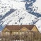 Square Picturesque winter view of multi storey homes built on top of a mountain