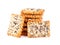 Square poppy seeds and sesame crackers isolated on white background. Dry cracker cookies isolated. Salty snacks isolated