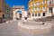 Square in Pula with historic Roman Golden gate street view