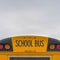 Square Rear of a yellow school bus with signal lights and emergency exit window