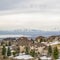 Square Residential area on a hill with view of lake valley and mountain in winter