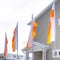 Square Row of colorful flags outside houses at a neighborhood in South Jordan City Utah