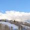 Square Row of homes on pristine snowy slope with unobstructed view of Wasatch Mountains
