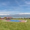 Square Scenic lake landscape with basketball court picnic pavilion and family homes