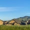 Square Scenic view of neighborhood in the valley with mountain and blue sky background