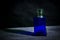 Square shaped blue glass perfume bottle