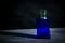 Square shaped blue glass perfume bottle