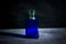 Square shaped blue glass perfume bottle