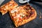 Square slices of delicious Italian style margarita pizza