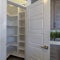 Square Small pantry with empty wall shelves at the corner of the kitchen of home