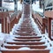 Square Stairway along colorful neighborhood homes on scenic snow covered hill in winter