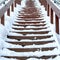 Square Stairway on a scenic nature and residential landscape with white snow in winter