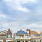 Square Stylish houses with front balconies against cloudy sky in Long Beach California