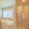 Square Traditional contemporary master bathroom interior with window