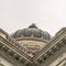 Square Utah State Capitol building and dome in Salt Lake City against bright cloudy sky