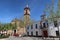 Square of the village of Jabugo, Huelva, Spain with the town hall and the church of San Miguel