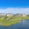 Square Whispy white clouds Panoramic view of a peaceful residential area at Daybreak, Utah